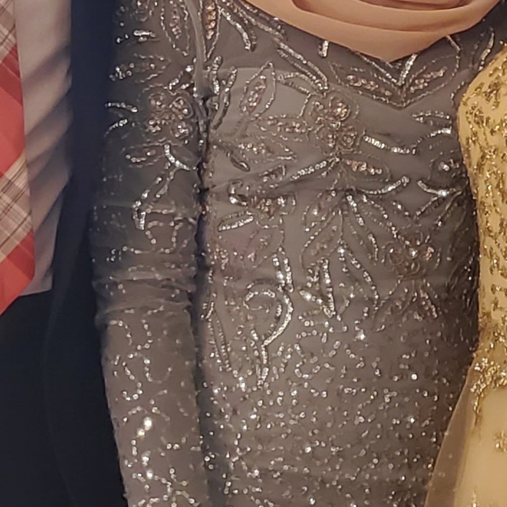 I bought this dress for a family wedding and I won't wear it again